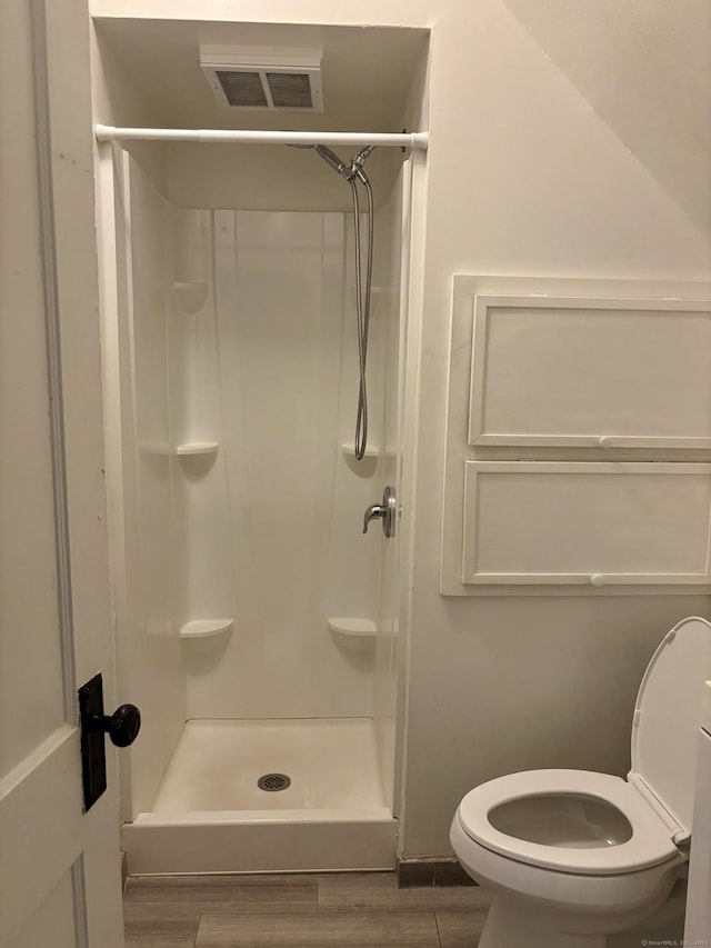 138 Mill Hill Ave, Bridgeport, CT 06610 - bathroom featuring wood finished floors and a shower stall