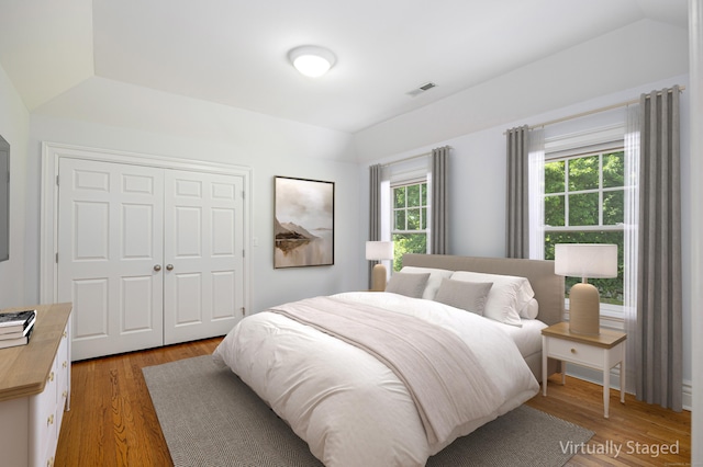 125 Nod Hill Rd, Wilton, CT 06897 - bedroom featuring light wood-style floors, a closet, and lofted ceiling