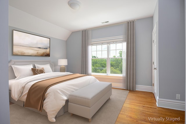 125 Nod Hill Rd, Wilton, CT 06897 - bedroom featuring light wood finished floors and vaulted ceiling