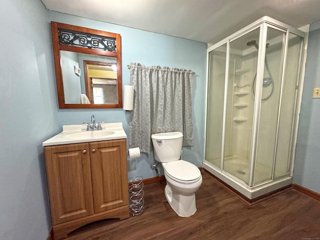 425 Scott Rd, Waterbury, CT 06705 - full bath featuring wood finished floors, vanity, and a shower stall