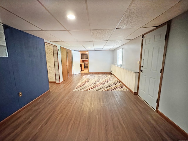 425 Scott Rd, Waterbury, CT 06705 - basement featuring wood finished floors and a drop ceiling