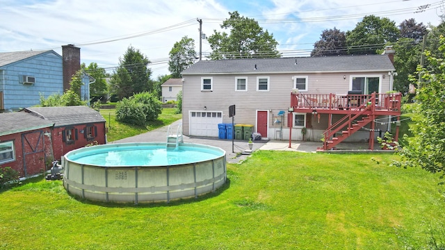 425 Scott Rd, Waterbury, CT 06705 - rear view of house with a wooden deck, stairs, a yard, and an outdoor pool