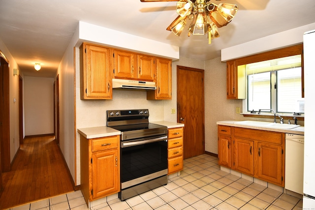 46 Millis St, Hamden, CT 06514 - kitchen with stainless steel range with electric cooktop, under cabinet range hood, ceiling fan, light countertops, and dishwasher