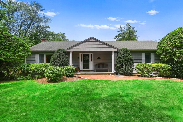 78 Kings Hwy S, Westport, CT 06880 - view of front of property with a front yard and a chimney