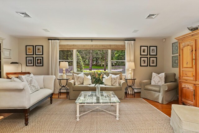 78 Kings Hwy S, Westport, CT 06880 - living area with wood finished floors and a baseboard radiator
