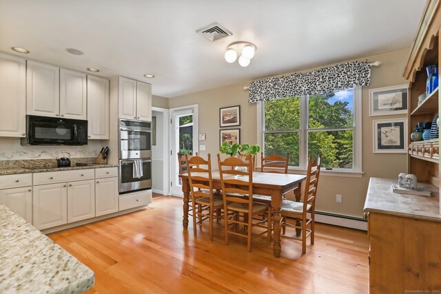 78 Kings Hwy S, Westport, CT 06880 - dining space with baseboard heating, light wood finished floors, and recessed lighting