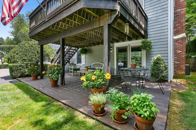 78 Kings Hwy S, Westport, CT 06880 - view of patio / terrace featuring a deck, outdoor dining space, and stairway