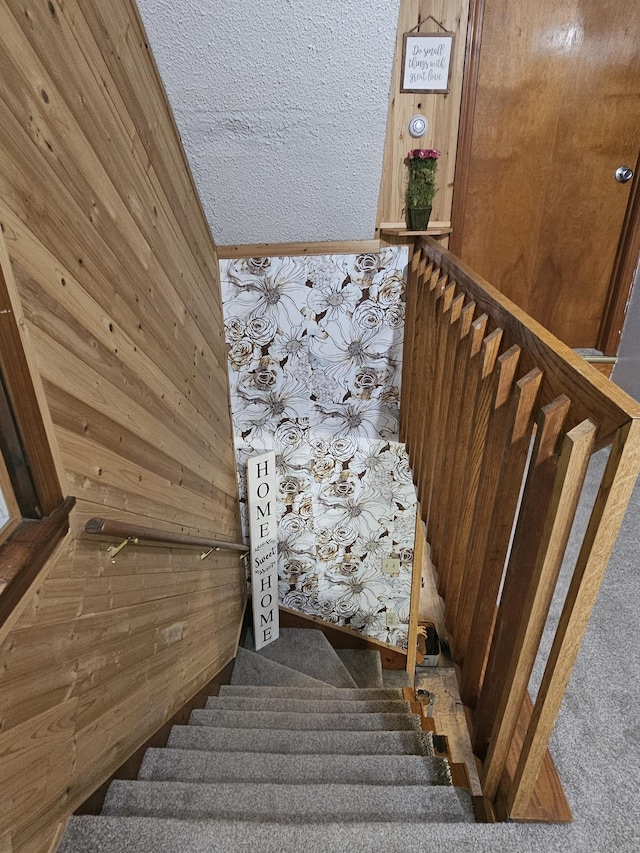 33 Tanner Ave, Norwich, CT 06360 - stairs featuring wooden walls and carpet floors