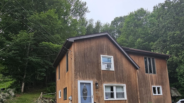 33 Tanner Ave, Norwich, CT 06360 - view of property exterior featuring a gambrel roof and cooling unit