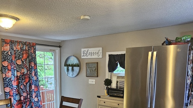 33 Tanner Ave, Norwich, CT 06360 - detailed view of freestanding refrigerator, a textured ceiling, a smoke detector, and cooling unit