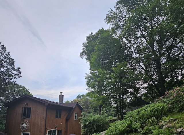 33 Tanner Ave, Norwich, CT 06360 - view of home's exterior featuring a chimney