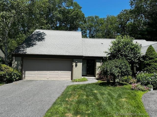 4 Heritage Crst Unit A, Southbury, CT 06488 - view of front of property with driveway, an attached garage, and a front lawn