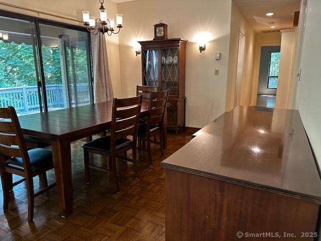 4 Heritage Crst Unit A, Southbury, CT 06488 - dining room with a chandelier