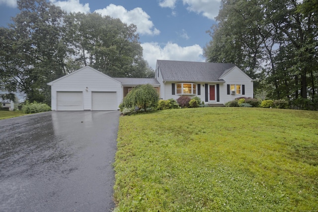 4 Birchwood Ter, Enfield, CT 06082 - view of front of home with asphalt driveway, a garage, and a front lawn