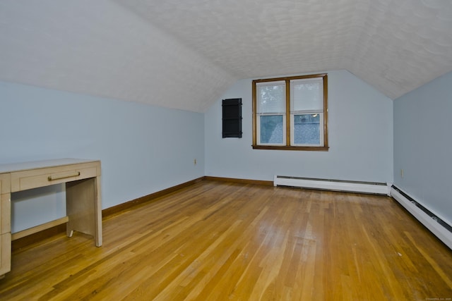 4 Birchwood Ter, Enfield, CT 06082 - bonus room with a baseboard radiator, light wood-style floors, and vaulted ceiling