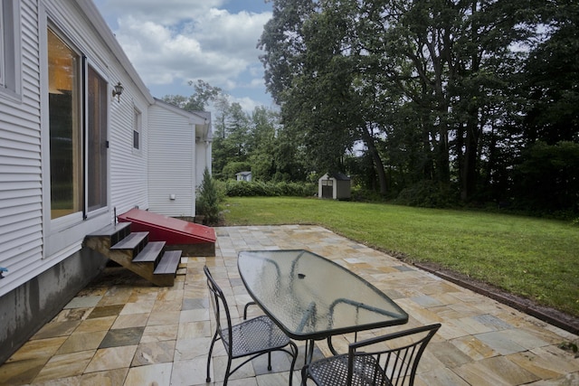 4 Birchwood Ter, Enfield, CT 06082 - view of patio / terrace featuring a shed and outdoor dining space