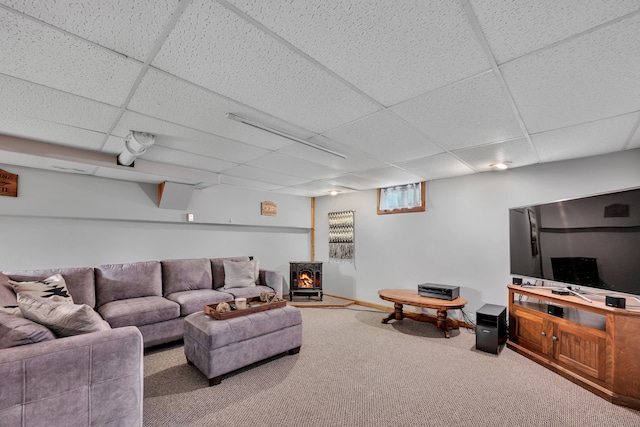 44 Durwin St, Middletown, CT 06457 - carpeted living room with a paneled ceiling and a wood stove