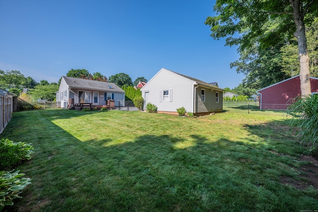 44 Durwin St, Middletown, CT 06457 - fenced backyard with a wooden deck