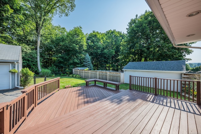 44 Durwin St, Middletown, CT 06457 - wooden deck with an outbuilding, a fenced backyard, and view of scattered trees