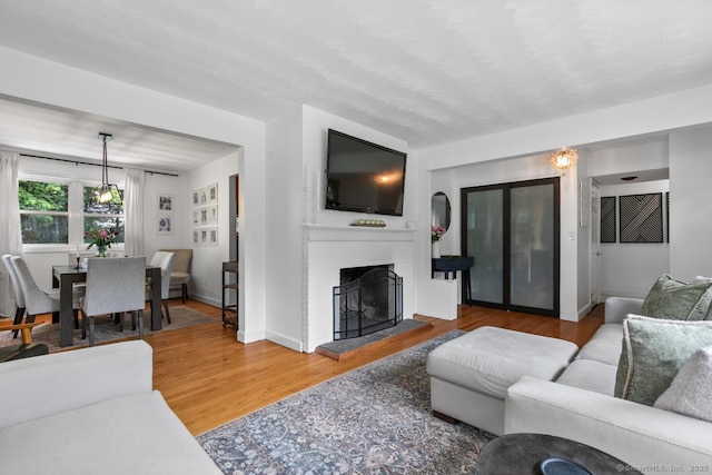 1762 Waterbury Rd, Cheshire, CT 06410 - living room with wood finished floors and a fireplace