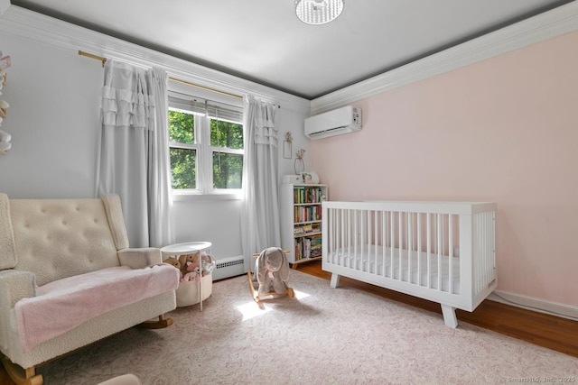 1762 Waterbury Rd, Cheshire, CT 06410 - bedroom featuring wood finished floors, a wall mounted air conditioner, crown molding, baseboard heating, and a nursery area