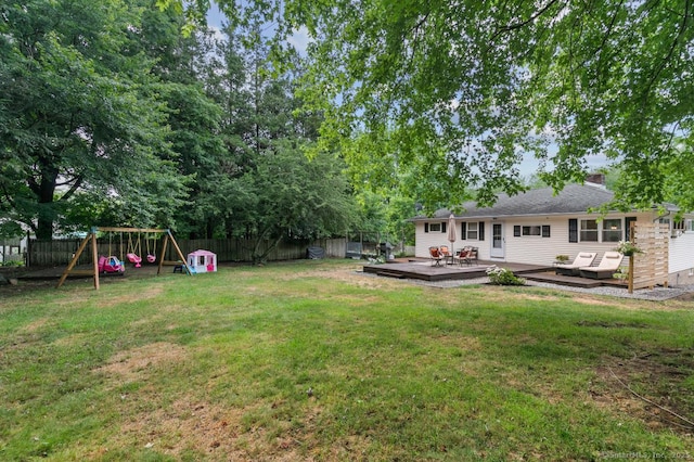 1762 Waterbury Rd, Cheshire, CT 06410 - fenced backyard with a deck and a playground