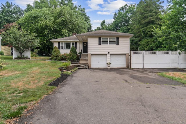 1762 Waterbury Rd, Cheshire, CT 06410 - tri-level home featuring driveway, an attached garage, and a chimney