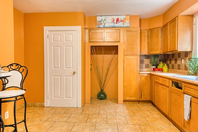 7 Ellsworth St, East Hartford, CT 06108 - kitchen with light countertops and tasteful backsplash