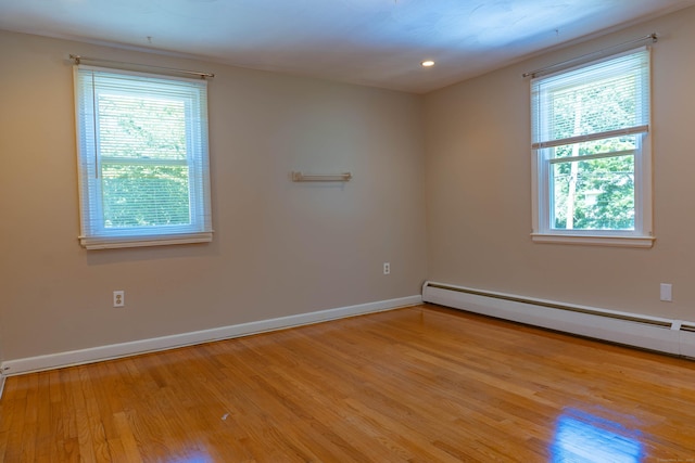76 Brookview Rd, Windsor, CT 06095 - unfurnished room featuring baseboard heating, light wood-style floors, and recessed lighting