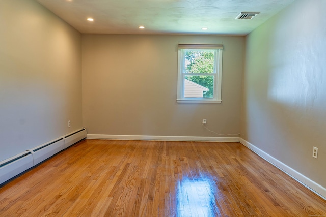76 Brookview Rd, Windsor, CT 06095 - spare room with a baseboard radiator, light wood-style floors, and recessed lighting