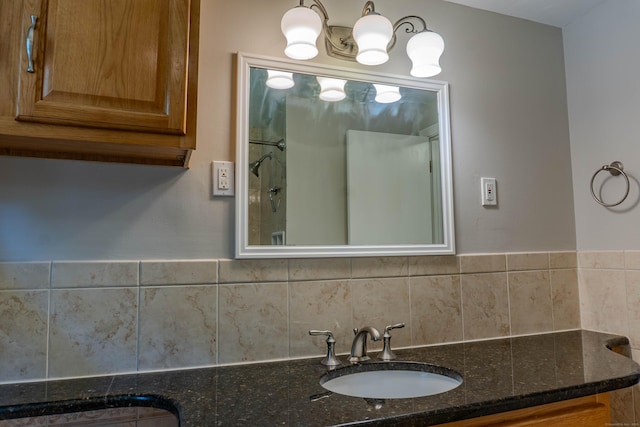 76 Brookview Rd, Windsor, CT 06095 - bathroom featuring vanity, backsplash, and a chandelier