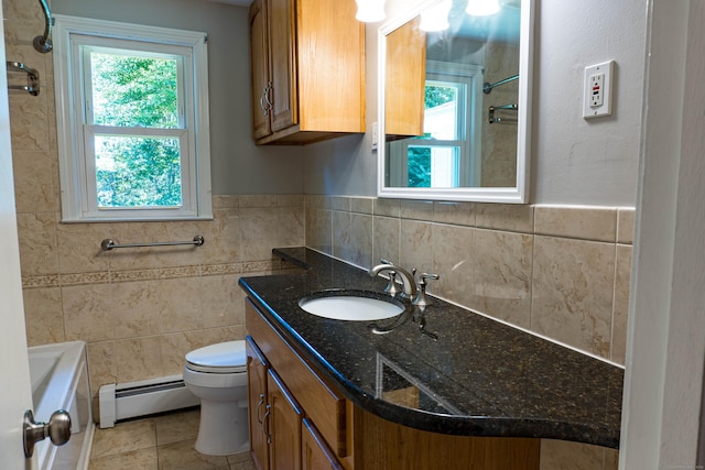 76 Brookview Rd, Windsor, CT 06095 - full bathroom featuring a baseboard heating unit, tile walls, vanity, healthy amount of natural light, and a bath