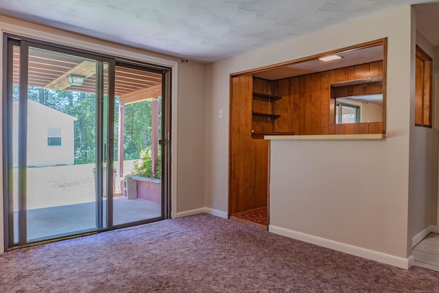 76 Brookview Rd, Windsor, CT 06095 - unfurnished living room featuring carpet flooring and baseboards