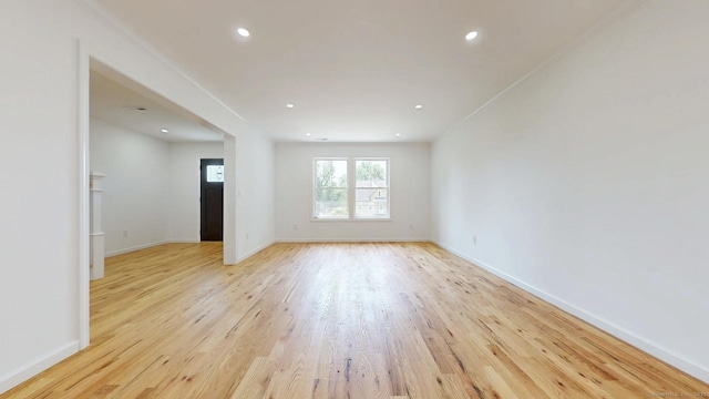 55A Moulthrop St, Ansonia, CT 06401 - empty room with light wood-style floors, recessed lighting, and crown molding
