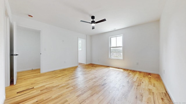 55A Moulthrop St, Ansonia, CT 06401 - unfurnished room with light wood-style floors and ceiling fan