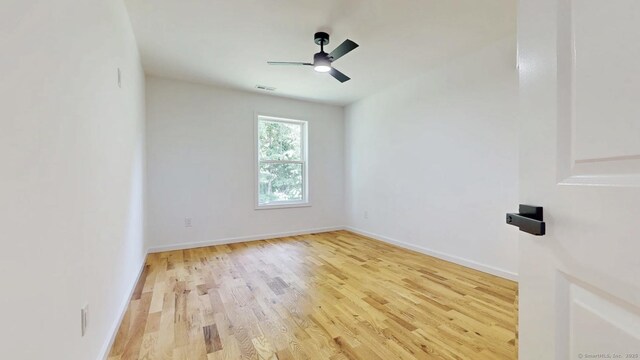 55A Moulthrop St, Ansonia, CT 06401 - spare room with wood finished floors and ceiling fan
