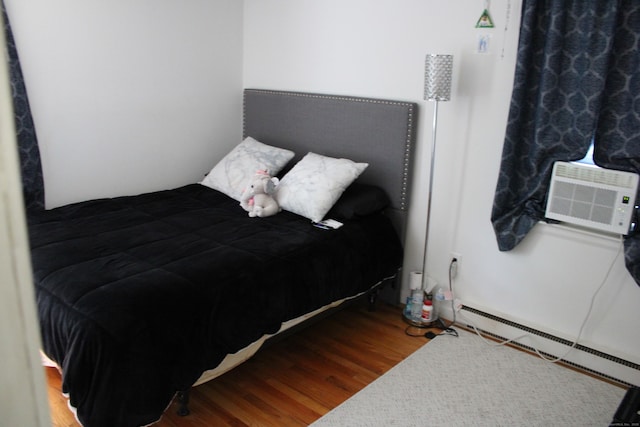66 Long Meadow Hill Rd Unit 1, Brookfield, CT 06804 - bedroom with wood finished floors, baseboard heating, and cooling unit