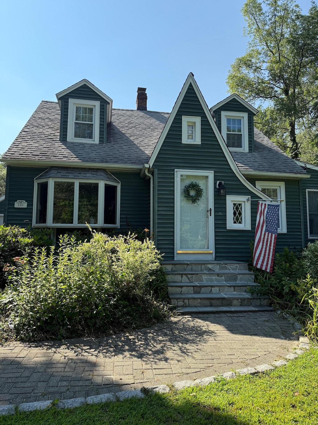 101 Shadduck Rd, Middlebury, CT 06762 - view of front of property featuring a chimney and a shingled roof