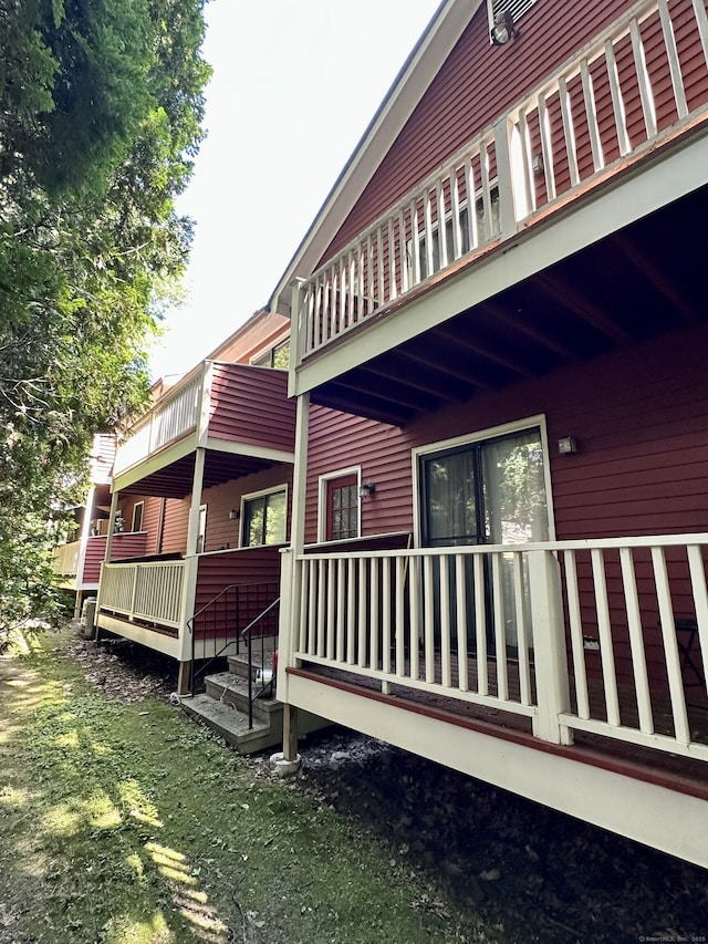 409 Glendale Ave Unit C2, Bridgeport, CT 06606 - view of side of home featuring a balcony