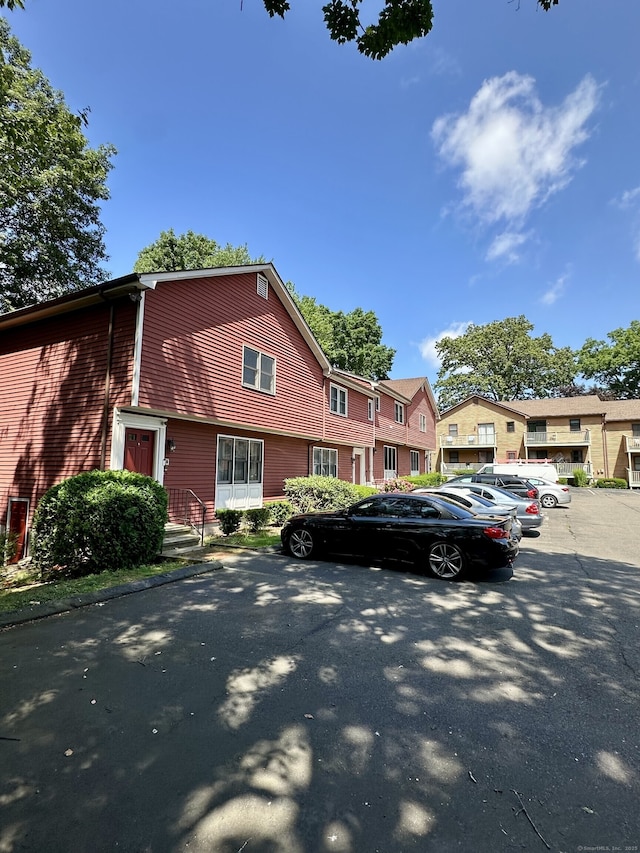 409 Glendale Ave Unit C2, Bridgeport, CT 06606 - view of front of property with uncovered parking and a residential view
