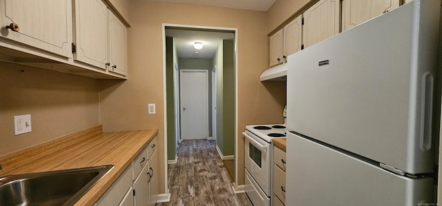 285 Savin Ave Apt B4, West Haven, CT 06516 - kitchen with white appliances, under cabinet range hood, dark wood-type flooring, and light countertops