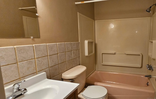 285 Savin Ave Apt B4, West Haven, CT 06516 - bathroom featuring shower / bathtub combination, tile walls, vanity, and wainscoting