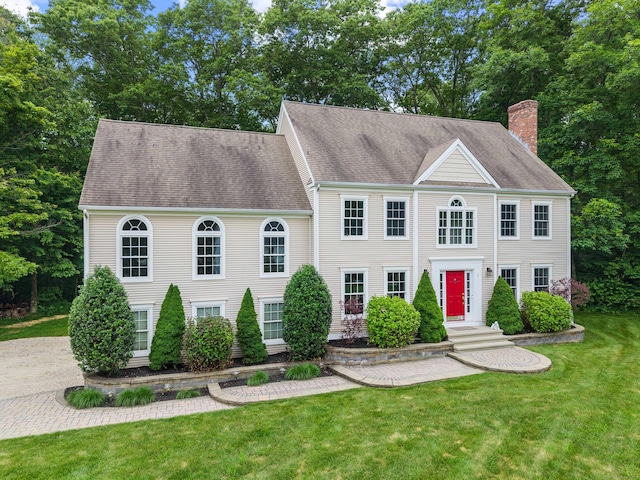 11 Acorn Dr, East Haddam, CT 06423 - colonial home with a chimney, a front yard, and roof with shingles