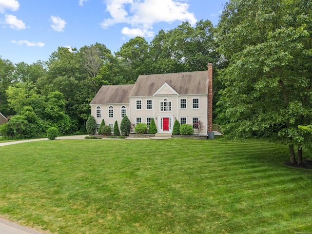 11 Acorn Dr, East Haddam, CT 06423 - colonial inspired home featuring a chimney and a front lawn