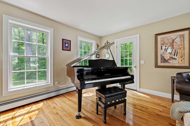 11 Acorn Dr, East Haddam, CT 06423 - sitting room with a baseboard radiator and light wood-style flooring