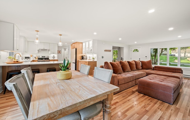 12 Warner Rd, East Haddam, CT 06423 - dining space with light wood-type flooring and recessed lighting