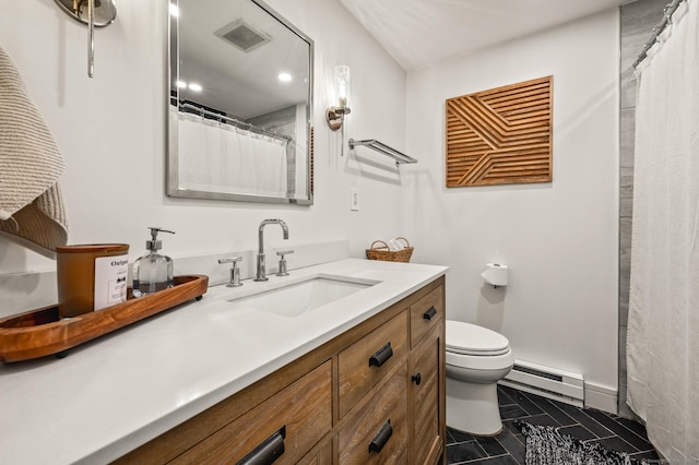 12 Warner Rd, East Haddam, CT 06423 - bathroom featuring baseboard heating and vanity