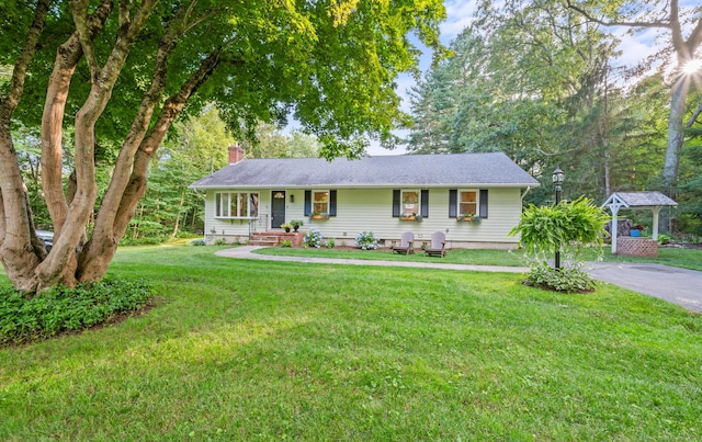 12 Warner Rd, East Haddam, CT 06423 - ranch-style house with a chimney and a front yard