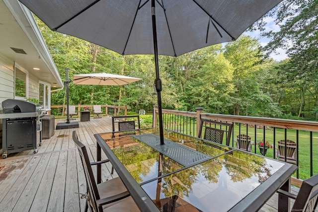 12 Warner Rd, East Haddam, CT 06423 - wooden terrace with outdoor dining area, a grill, and a yard