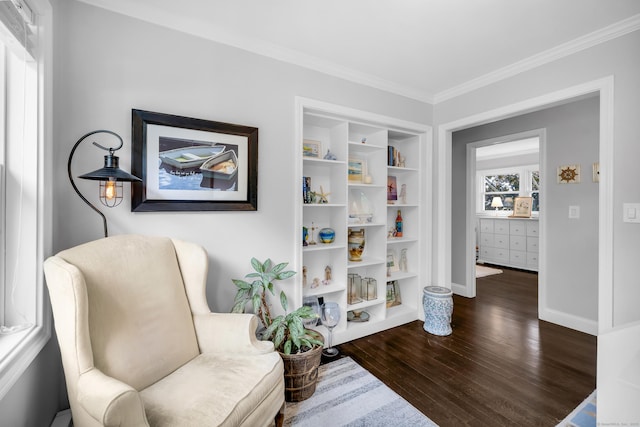 423 Whitfield St, Guilford, CT 06437 - sitting room featuring dark wood finished floors and ornamental molding